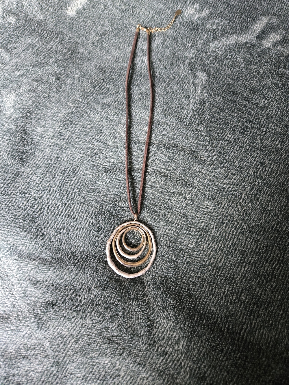 Layered Circle Pendant Necklace in Bronze on Brown Cord